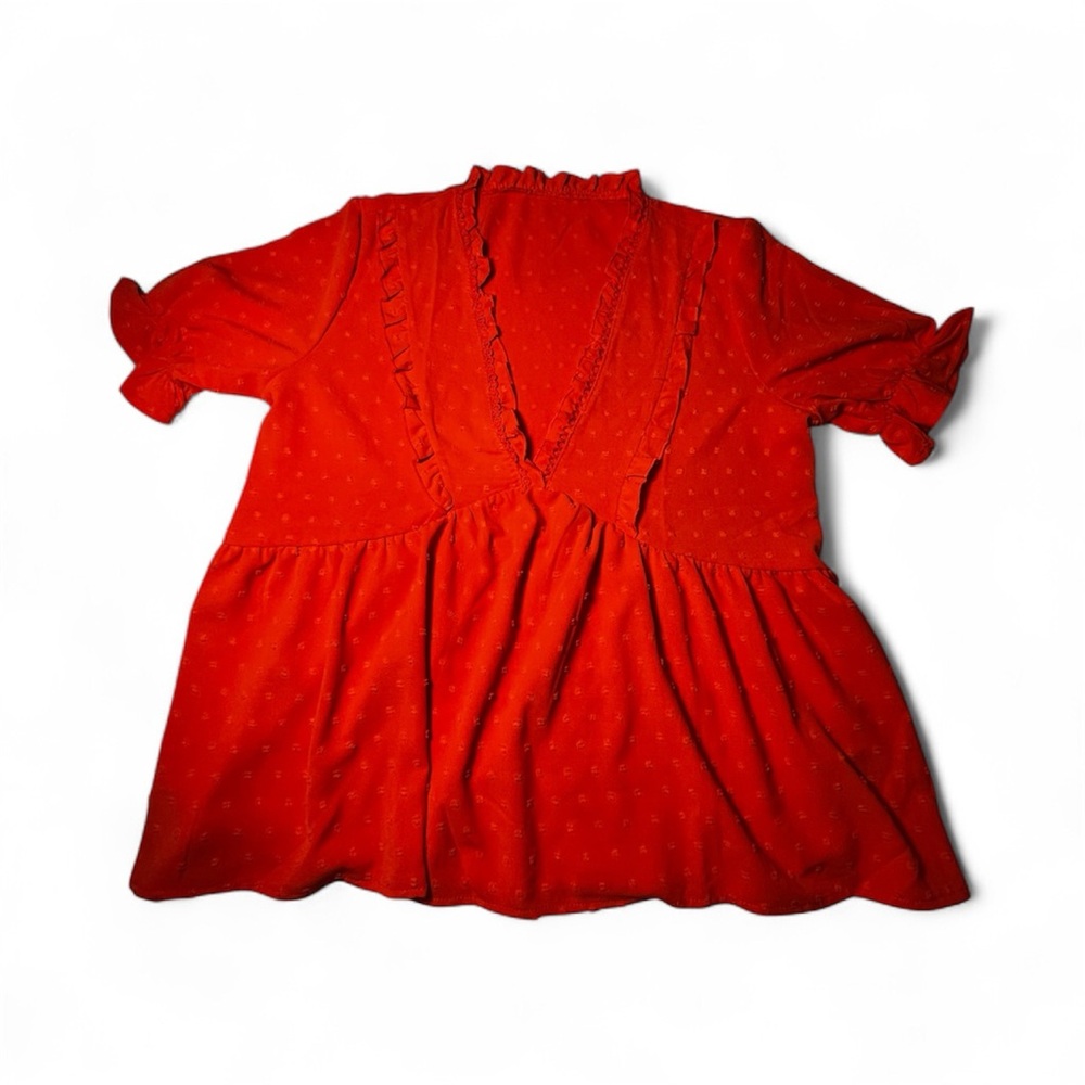 Orange Ruffled Blouse.